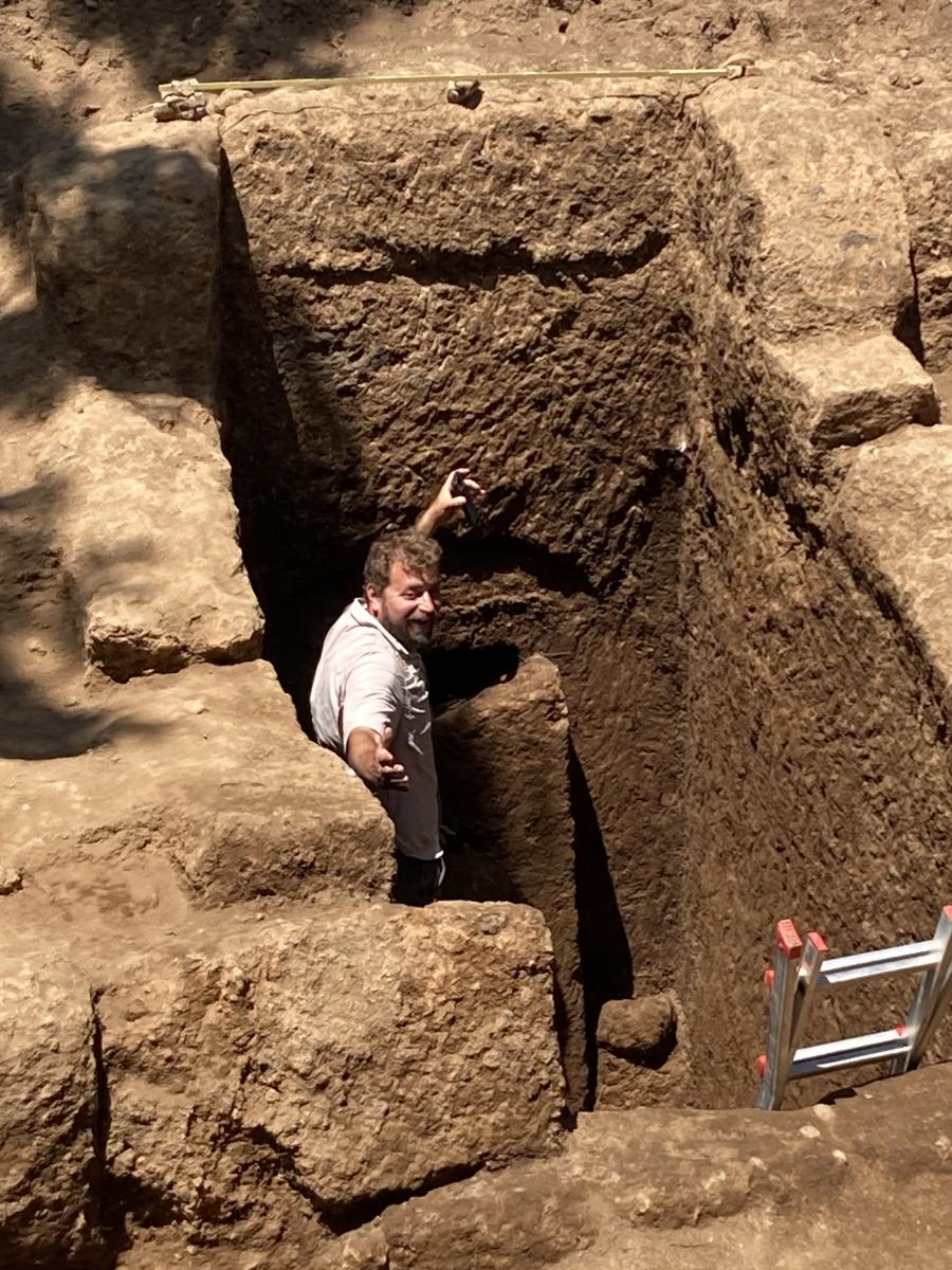 Davide Zori, Ph.D., stands outside entrance to recently discovered intact Etruscan tomb.